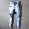 Högkvalitativa herr design jeans nödställda motorcykel cyklist jeans rock mager rippade hål rand berömda märke denim byxor