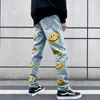 Men's Jeans American style high street leak knee hole jeans men slim fit small feet popular smiling face printing national Hip Hop Pants trend