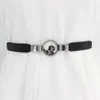 black belt with circle buckle