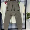 Pantalons pour hommes Ins poche d'outillage de démontage utilisé petit pied mode masculine coupe ajustée vêtements tactiques élastiques loisirs industrie lourde tissu militaire