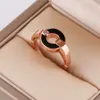 Europa Amerika Modestil Dame Frauen Titan Stahl gravierte B-Initialen Einzeldiamant Perlmutt Onyx Malachit Ring 3 Co294M