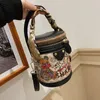 Wholesale ladies shoulder bags sweet cute bear graffiti bucket bag street trend cylinder women ribbon handbag European popular contrast leather backpack 7771