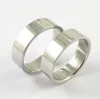 Högkvalitativ designer rostfritt stål bandringar mode smycken mäns bröllopslöfte ring kvinnors gåvor
