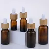 5ml 10ml 15ml 20ml 30ml 50ml 100ml Flaconi contagocce cosmetici per olio essenziale di vetro ambrato con contagocce e tappo di bambù