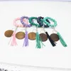 Moda Pulseras de cuentas de madera Borla de haya Llavero Colgante de fiesta Pulsera de cuero Llavero de mujer Llaveros de mujer Disco de muñeca de madera Anillos de cuentas