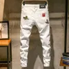 Erkekler yeni beyaz kuş işlemeli hip hop kot pantolon moda ince sıska sıradan erkek streç denim kot pantolonlar pantolon 28 - 38 201111