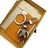 مصمم SPACEMAN KEY RING رسالة عالية الجودة ملحقات سلسلة مفاتيح معدنية للجنسين الفضية الفضية كلاسيكية فتحة الزجاجة الافتتاحية Robot Car K258L