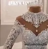 Robes de mariée luxueuses robe de bal Dubaï arabe cristaux à col haut perles 3D dentelle appliques ruché longues robes de mariée à manches longues