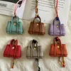 Mini Totes Сумочка для девочек, детский кошелек, дизайнерские кольца для ключей, сумки, вешалка, брелок, роскошный футляр, крючок для сумок, высококачественные женские сумки на ремне, чехлы для наушников, наушники HBP