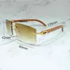 2023 디자이너 안경 새로운 대형 남성 림리스 디자이너 선글라스 여성을위한 고급 빈티지 쉐이드 제품 트렌드 제품