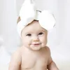 新しい10色の赤ちゃんガールビッグボウナイロンヘッドバンドファッションスーパーソフトキャンディーカラーボヘミアボウガール幼児ヘア弓アクセサリーヘッドバンド
