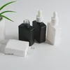 BlackWhite Glass Dropper Bottle Cosmetic Square Essential Dropper Packaging Bottles with White Caps Pipette 30ml Whole6297962