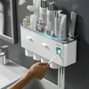 Porte-brosse à dents Accessoires de salle de bain Support de rangement Distributeur de presse-dentifrice Support mural automatique Adsorption magnétique LJ201204