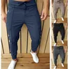 Mens sólido cores calças moda tendência zipper botões cordão esportes esportes lápis calças primavera macho linha plissada zíper calça magra ocasional