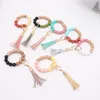 Wholesale foreign trade food grade silicone beads wrist keychain alloy cap PU leather tassel keychain female multicolor optional