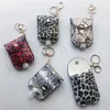 Snakeskin Leopard Print Hand Sanitizer Titular PU Leather Keychain Soap Mão Bag Bottle Titular recarregáveis ​​30ML Leakproof viagem Bottle Titular