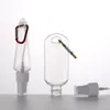 キーホルダーと50mlの空のアルコール詰め替え可能なボトルトラベルボトルスプレーキャップKKA1795のための透明な透明なプラスチック手のサニタイザーのびん