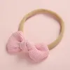20 pcs / lote, macio corduroi nó arco headbands de nylon ou clipes de cabelo, presente de chá de bebê lj201226