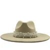 秋冬女性の大型の岩の帽子の真珠のベルト模様の模様の帽子Felet Fedora帽子ジャズパナマキャップサンハットファッションキャップ卸売