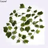 Luyue 10pcs folhas de uva de seda artificial folhas penduradas festão faux videira hera ao ar livre verde folhas de jardim decoração de casa de casamento 201222