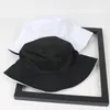 Cloches iki yan geri dönüşümlü siyah beyaz katı kova şapkası unisex chapeau moda balıkçılık yürüyüş bob kapakları kadınlar erkek panama yaz15172490