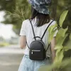Ins Super 2021 الربيع والصيف النسخة الكورية من جديد من ميني حقيبة الظهر الأزياء النسائية حقيبة crossbody الإناث حقيبة السفر