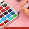 50 pcs sólido aquarela pintura conjunto de arte suprimentos aquarela kit de pigmento de água cor de água conjunto com desenho caneta escova ferramentas de pintura 201226