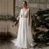 Fantastyczny Szyfonowa Linia Beach Suknie ślubne Głębokie V Neck Koronki Aplikacje Koraliki Sexy Backless Długie Okłady Przylądek Boho Ogród Sukienka Bridal Sweep Rates De Mariée AL9865