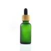 frasco conta-gotas de vidro de óleo essencial com tampa de bambu frasco de soro de bambu fosco verde azul âmbar claro 10ml 15ml 20 30ml 50ml 21 G28564946