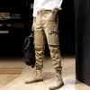 Męskie dżinsy Projektant mody Mężczyźni Duża kieszeń Dorywczo Kombinezony Cargo Spodnie Wysokiej jakości Streetwear Kolor Khaki Hip Hop Joggers Spodnie