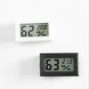 جديد أسود / أبيض FY-11 مصغرة الرقمية LCD بيئة ميزان الحرارة الرطوبة الرطوبة متر في الغرفة ثلاجة الثلج