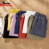 Femmes printemps été pantalons coton lin solide taille élastique bonbons couleurs sarouel doux de haute qualité pour femme ladys S-XXL 201119