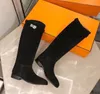 ファッションケリーバックル女性本革ニーブーツレディースマーティンブーツデザイナーフラット女性の冬の騎士のブーツ Sapatos Mujers