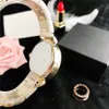 Marque de mode avec logo de luxe femmes filles coloré diamant Style métal acier bande Quartz montre-bracelet COA 10