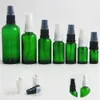 白い黒のプラモンポンプ5cc 15ccの小さな化粧品のスキンケアと20個の10mlの10ml 20ml 30mlの50ml 100mlの緑色のガラスの瓶