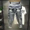 Pantaloni in denim alla moda 2021 Pantaloni Harem da uomo di marca da uomo Pantaloni multi-tasca Retro Hiphop Stretch Tuta Jeans larghi per adolescenti