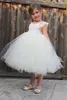 Longitud del té blanco Vestidos de niñas de flores baratos para el banquete de boda Tul Lindo vestido de bola Niños Ropa de fiesta formal