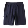 Shorts masculino Fornecimento exclusivo transfronteiriço de vestuário de comércio exterior Calças quíntuplas de cores puras Roupas esportivas de algodão Calças de praia de marca