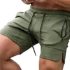 Calções dos homens esporte de verão solto casual sólido cordão cintura ginásio rodando fitness curto com bolsos com zíper homens qiucker seco