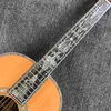 La chitarra acustica con tastiera in ebano OOO con corpo tondo in cedro massiccio personalizzato con paletta EQ pickup può essere personalizzata con logo