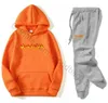 Erkek Eşofman Tasarımcısı Alev Baskılı Setler Erkek Koşu Takımları Hoodies Pantolon Seti Sonbahar Kış Gündelik Unisex Marka Spor Giyim Setleri ERKEK Kadın İki Parçalı Kıyafetler