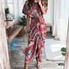 女性夏のエレガントなボタンRUCHED包帯シャツドレスファッション半袖ソリッドVネックビーチマキシ