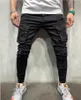 Грузовые брюки Карманные мужчины Джинсы Ск-Сексуальные отверстия Брюки Черные джинсы Джинсовые брюки Мужчины Jogger Повседневная длинная карандаш одежда