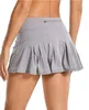 L-07 jupes de tennis jupes de yoga plissées gym vêtements femmes courir fitness golf pantalons shorts de sport arrière-plan