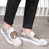 2023 spring and summer new real Python skin men's shoes flat bottom fashion trend embroidered British style leisure sports Doudou shoes