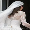 Классические дешевые белые свадебные платья трапециевидной формы 2021 года с V-образным вырезом и прозрачным кружевом с длинными рукавами и аппликацией Кейт Миддлтон с пуговицами сзади Royal Bridal G2158