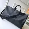Designers Duffel Bags 45CM 50CM 55CM luxury large capacity travel sale High women men Genuine Leather shoulder Fashion bag carry rivets with lock head----5AAAAA