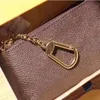 Designer Lady Bag Coin Pouch Hommes Femmes Porte-clés en cuir Mini Portefeuilles Numéro de série Boîte Dust Bag