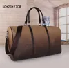 50 cm moda de luxo bolsa de viagem masculina feminina bolsas duffle designer de marca bolsas de bagagem de couro pu bolsa esportiva de grande capacidade307n