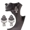 Femmes fleur sculpté longue petite cloche boucles d'oreilles dames bijoux bohème Vintage ethnique boucles d'oreilles pour femme